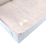 Warme und kuschelige Wickeldecke aus MeriBoo-Merinowolle