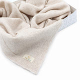 Warme und kuschelige Wickeldecke aus MeriBoo-Merinowolle